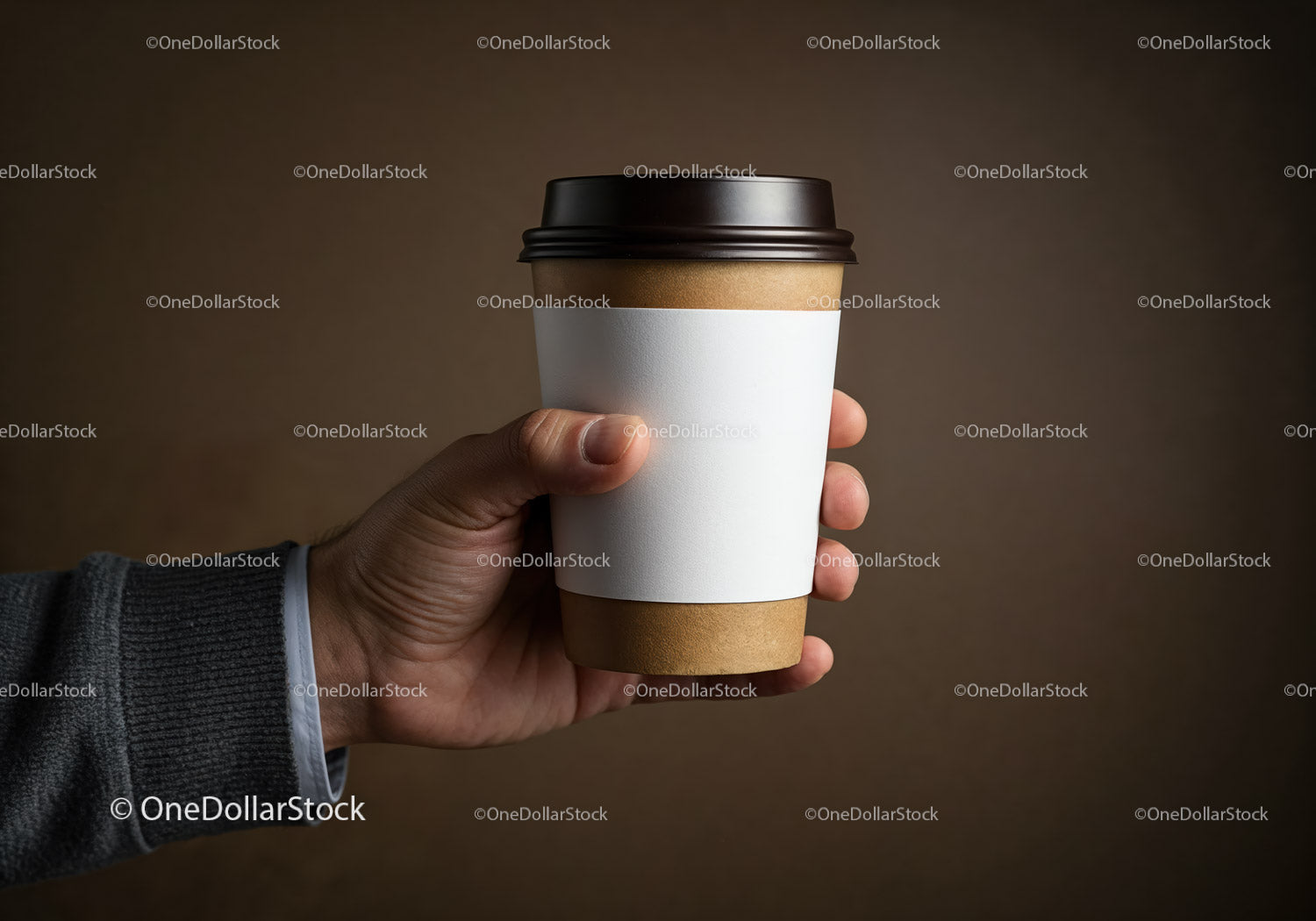 Hand Holding Takeaway Coffee Cup with Blank Sleeve