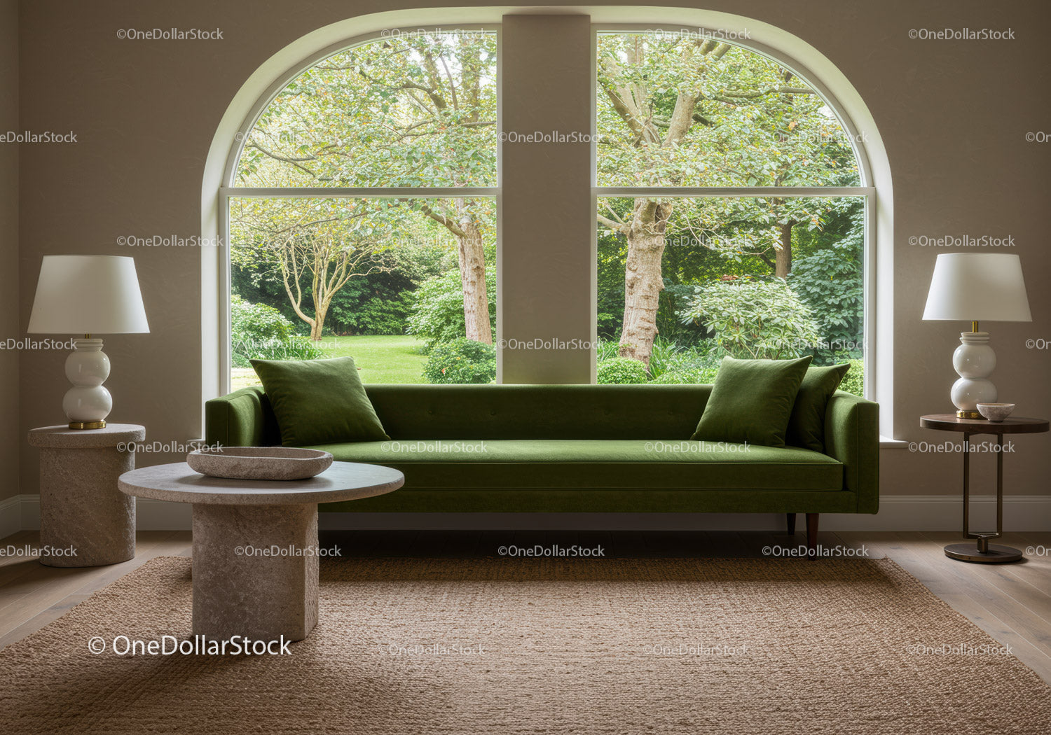 Minimalist living room with green sofa and garden view