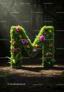 Lush Green Letter M Decorated with Orchids in Forest