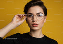 Stylish Woman Wearing Glasses Against Bright Yellow Background