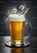 Refreshing beer glass with ice cubes splashing over