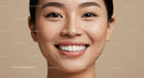 Close up of smiling young woman with flawless skin