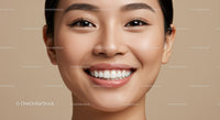 Close up of smiling young woman with flawless skin