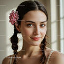 Portrait of a Young Woman with Braided Hair and Pink Flower Accessory