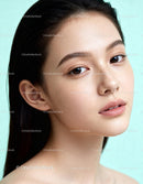 Close-up portrait of natural young woman with clear skin