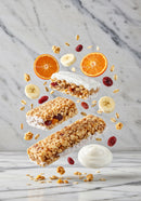 Healthy granola bars with yogurt and fresh fruit slices