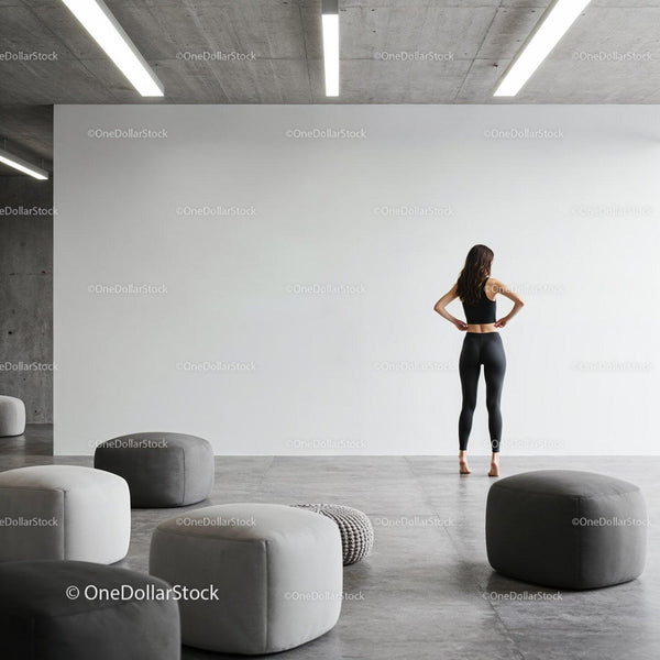 Woman in activewear stretching in modern minimalist room JPG Mockup Image