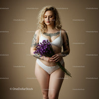 Elegant Woman with Lavender Bouquet in White Lingerie