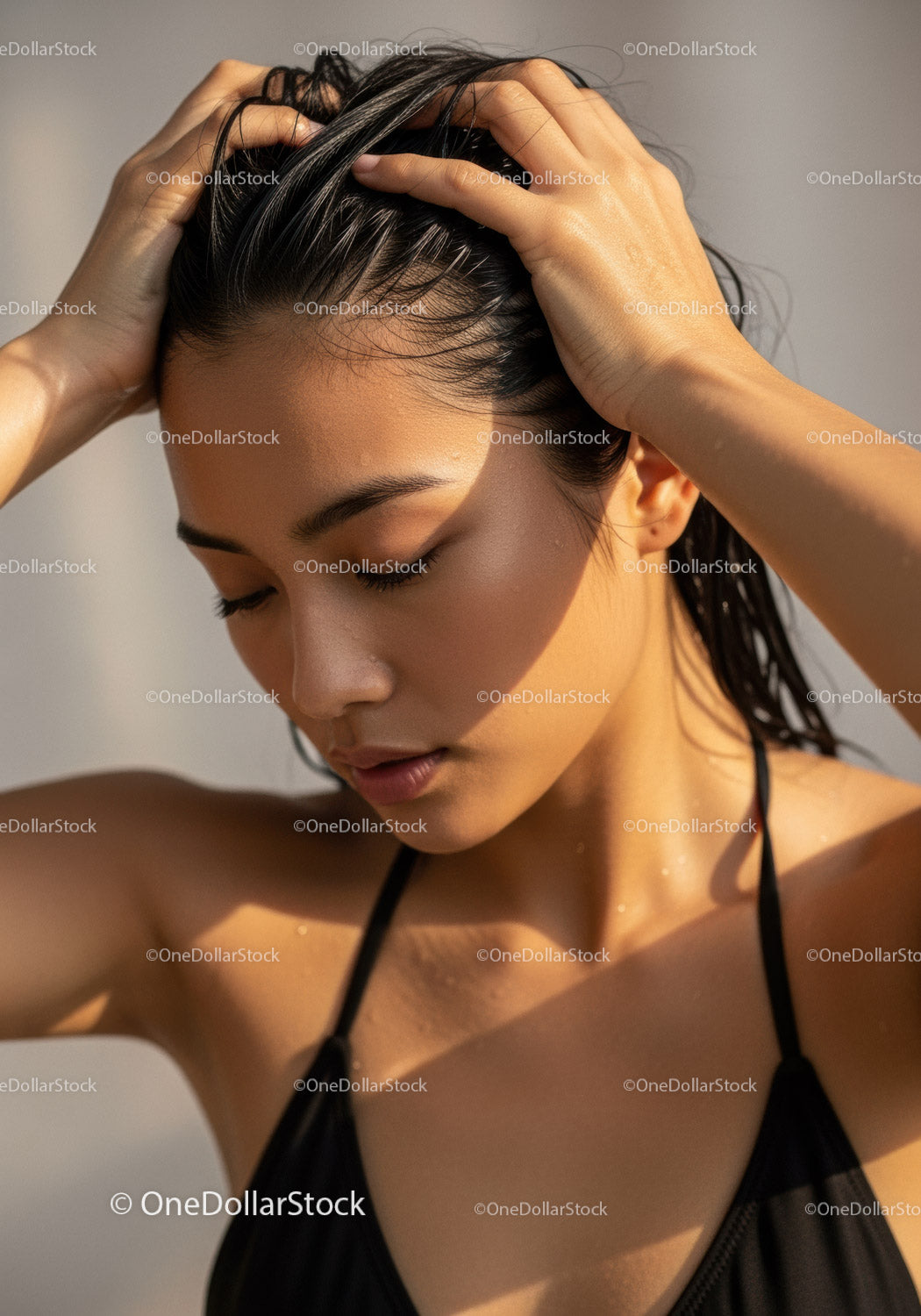 Sunlit Portrait of a Young Woman with Black Hair and Natural Beauty