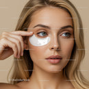 Beautiful blonde woman with eye patch in skincare routine