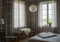 Cozy bedroom with soft natural light and neutral decor