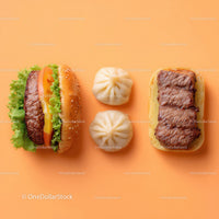 Gourmet Burger with Lettuce and Tomato Next to Grilled Steak and Dumpling