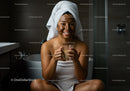 Young Woman Enjoying a Spa Moment with Towel and Mug