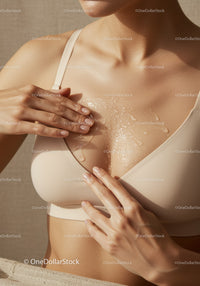 Beautiful Woman Applying Body Lotion for Soft Smooth Skin