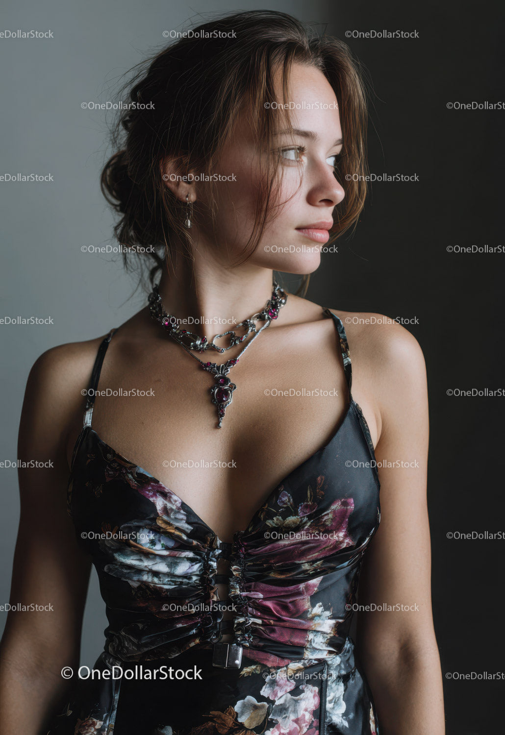 Elegant Young Woman Wearing Jewelry and Floral Dress in Studio