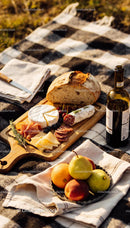 Rustic Picnic with Artisan Bread, Cheese, and Wine