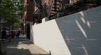 City Sidewalk with Pedestrians and Tree Shadows