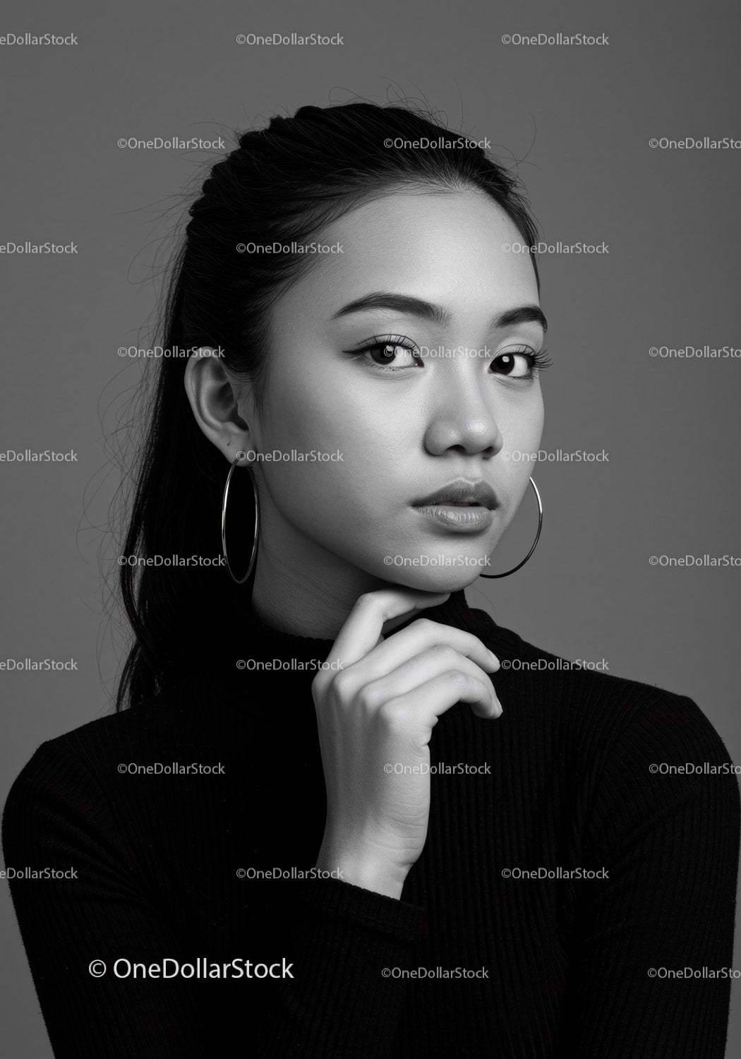 Elegant Black and White Portrait of a Confident Young Woman