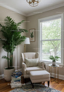 Cozy Living Room with Comfortable Armchair and Green Houseplants