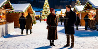 Couple chatting warmly at festive winter market night