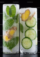 Clear Ice Blocks with Fresh Herbs and Cucumber Slices