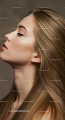 Profile of serene young woman with flowing hair