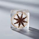 Star Anise Frozen Inside Transparent Ice Cube Closeup