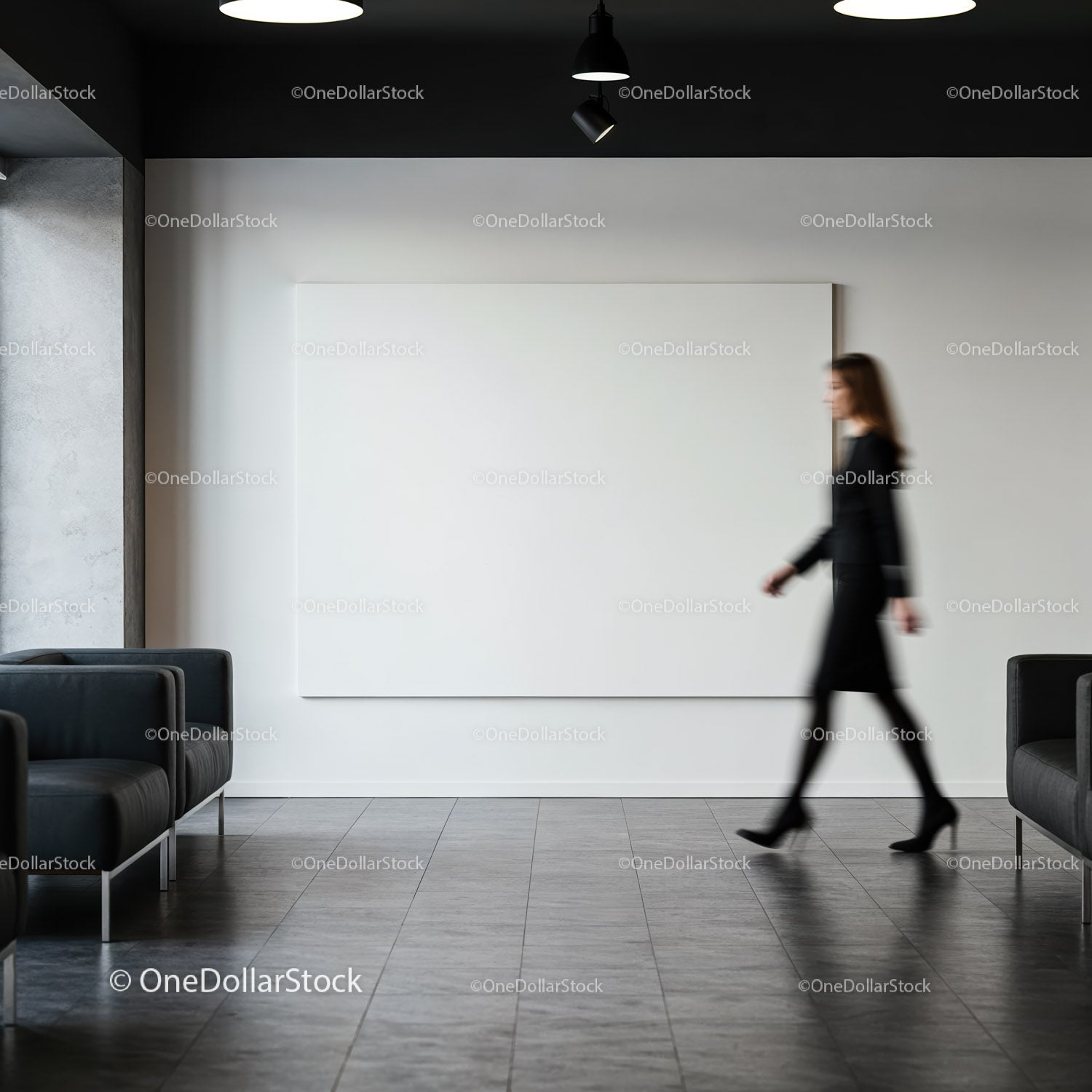 Businesswoman walking in modern office lobby with blank canvas