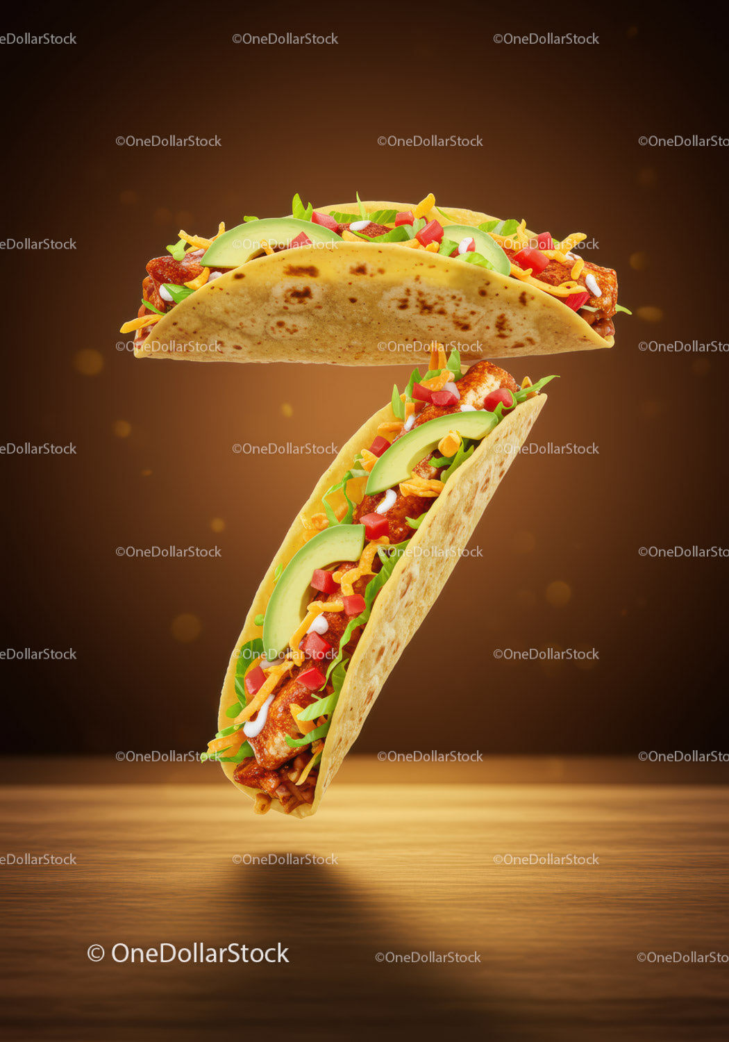 Two flavorful tacos with fresh vegetables and cheese