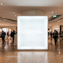 Bright Empty Advertisement Board in Shopping Mall Lobby