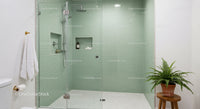 Modern Glass Shower with Green Subway Tiles and Natural Décor