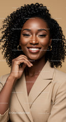 Elegant African American Woman in Blazer with Curly Hair Smiling