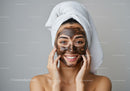 Young Woman Applying Relaxing Green Tea Facial Mask for Skincare