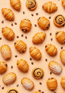Assorted French Pastries with Coffee Beans on Beige