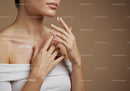 Close-up of a Woman Applying Skincare Cream on Shoulder and Neck