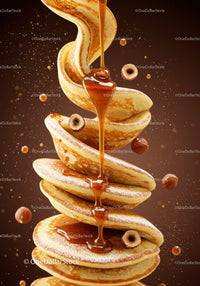Golden syrup cascading over stack of fluffy pancakes