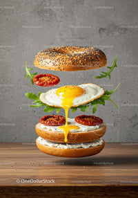 Deconstructed bagel with fried egg and sun-dried tomatoes