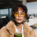 Stylish Woman Wearing Yellow Mirrored Sunglasses and Fur Coat