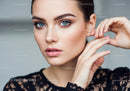 Elegant Woman with Blue Eyes and Flawless Skin in Studio Setting