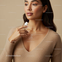 Elegant Woman Applying Perfume in Neutral Tones for Beauty and Lifestyle