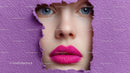 Captivating Female Portrait with Vibrant Pink Lipstick