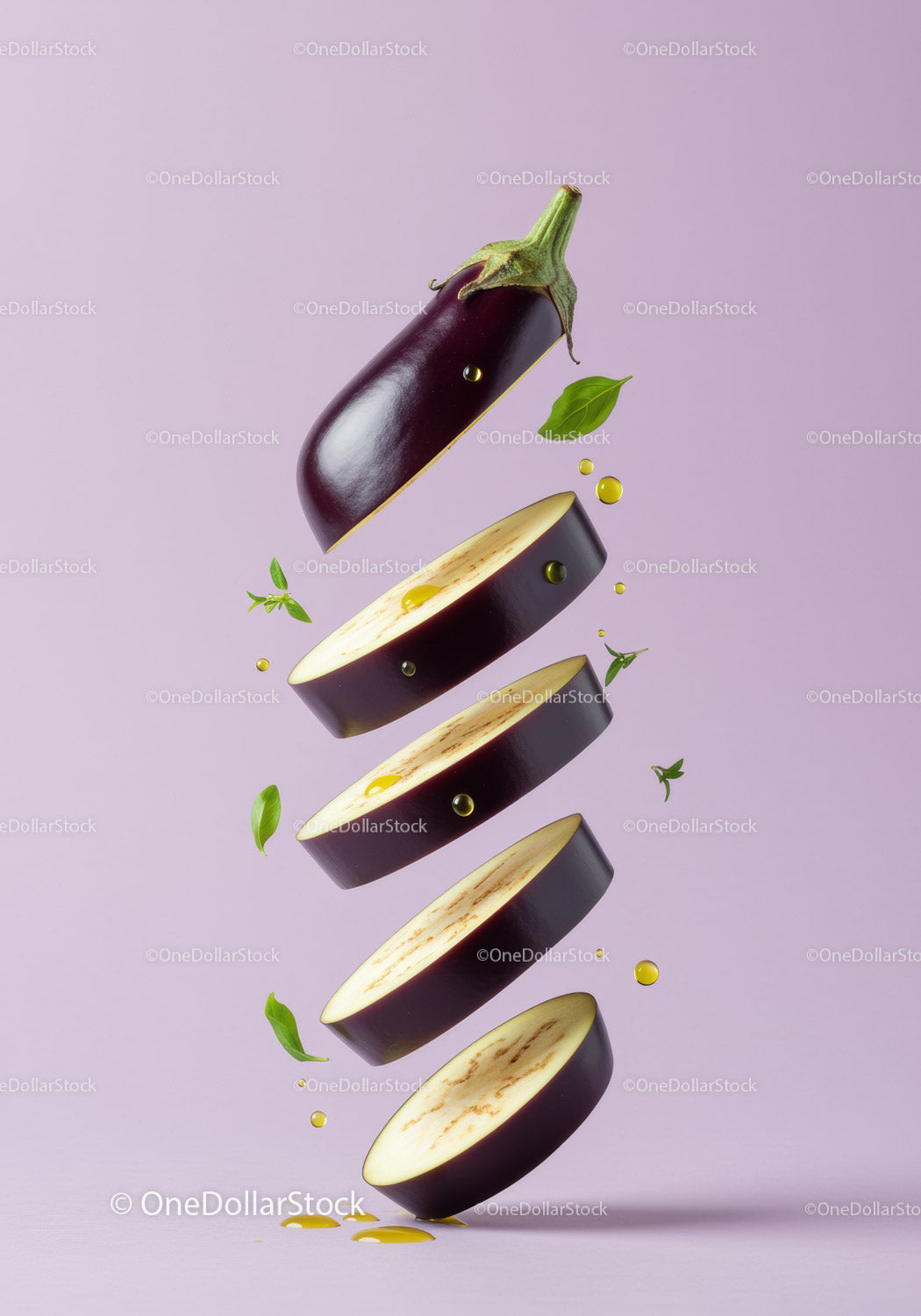 Sliced eggplant with herbs and olive oil drops on pastel