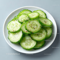 Fresh Sliced Cucumber on White Plate for Healthy Food and Cooking