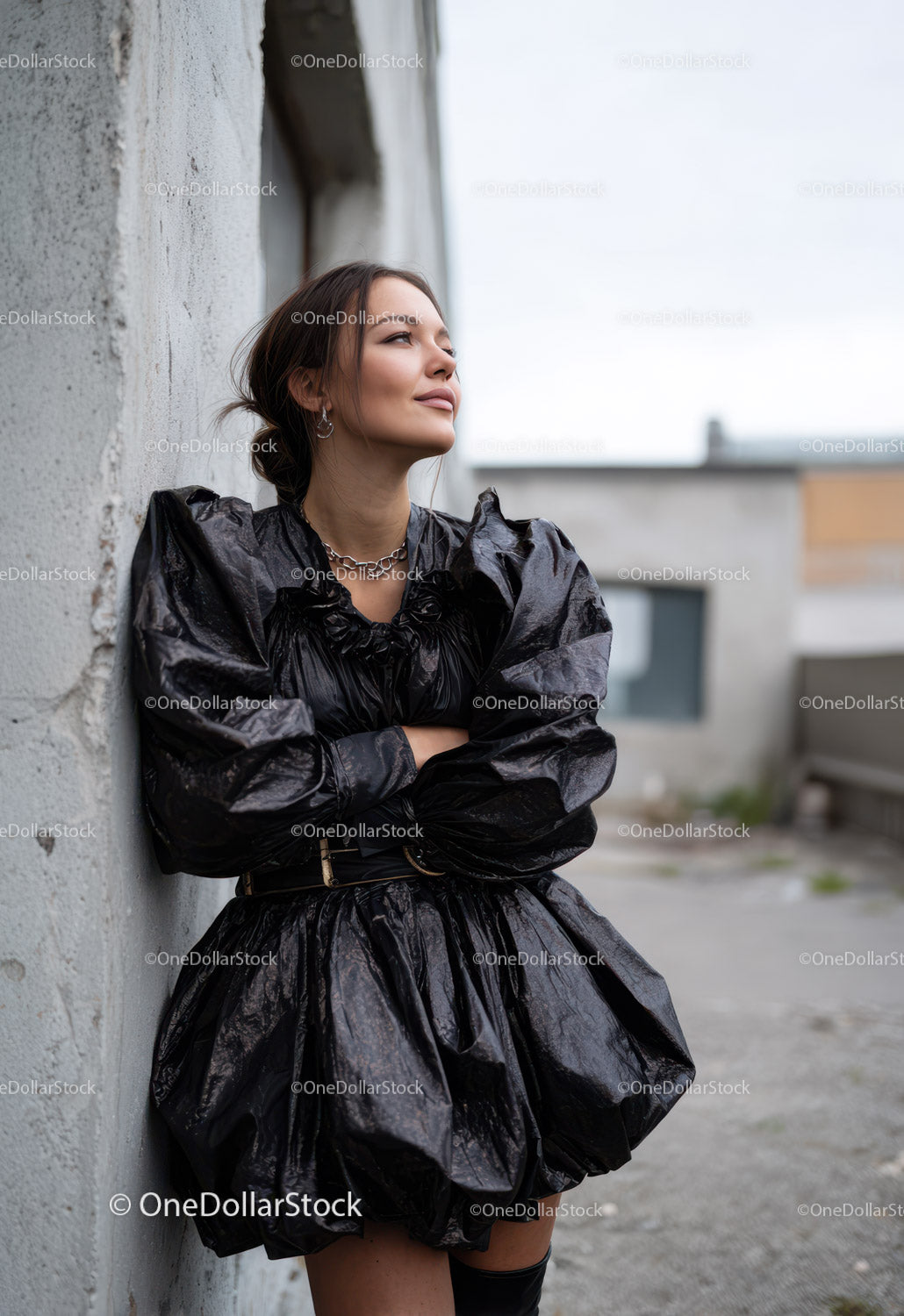 Stylish Woman in Black Shiny Dress Posing Outdoors