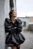 Stylish Woman in Black Shiny Dress Posing Outdoors