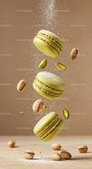 Green pistachio macarons with powdered sugar falling