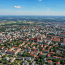 Aerial View of Urban Cityscape with Downtown and Green Parks