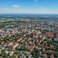 Aerial View of Urban Cityscape with Downtown and Green Parks