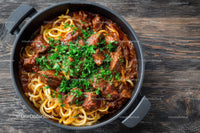 Beef and Mushroom Pasta in a Cast Iron Skillet with Cherry Tomatoes