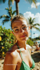 Young Woman in Green Bikini Smiling on Tropical Beach